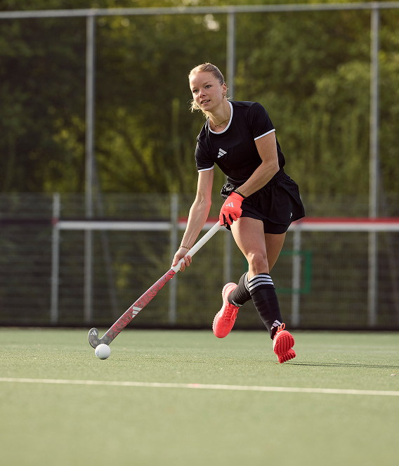 Adidas hockey player in action